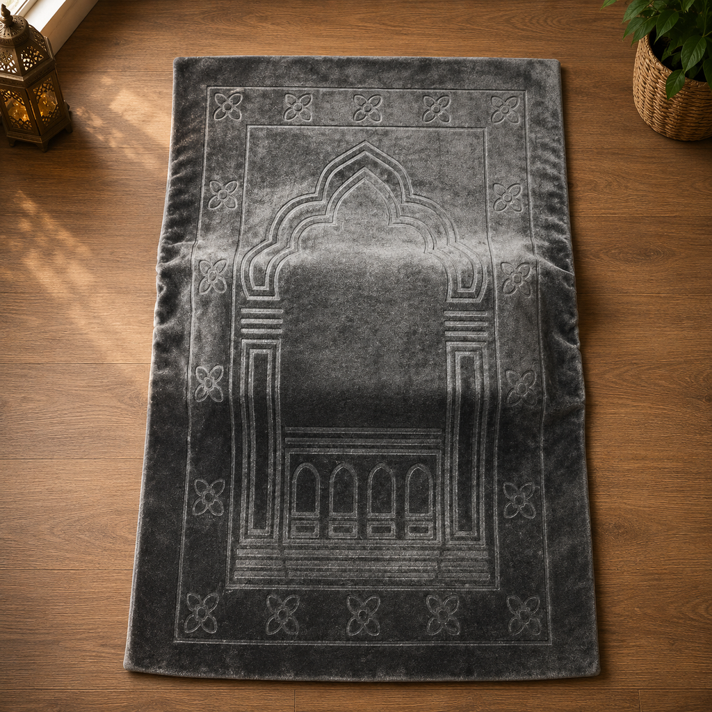 Grey Islamic prayer mat with traditional arch and floral border design.