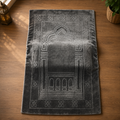 Grey Islamic prayer mat with traditional arch and floral border design.