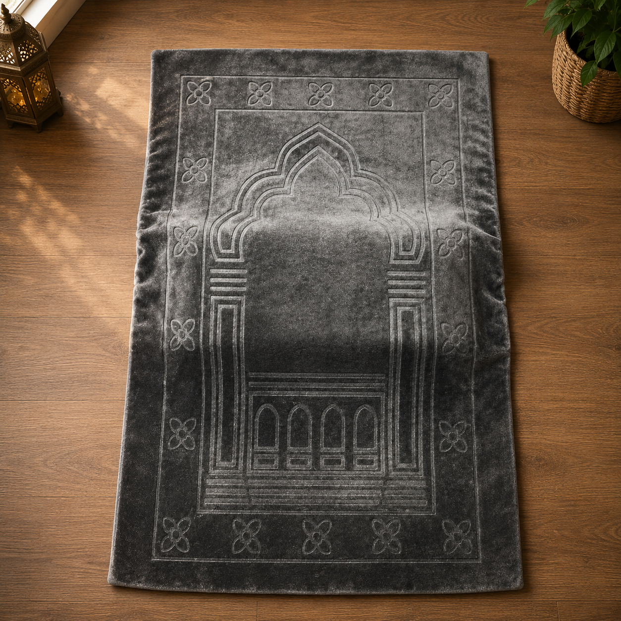 Grey Islamic prayer mat with traditional arch and floral border design.