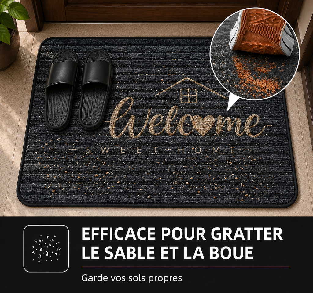 Black welcome doormat with a house design, effectively trapping dirt and mud.