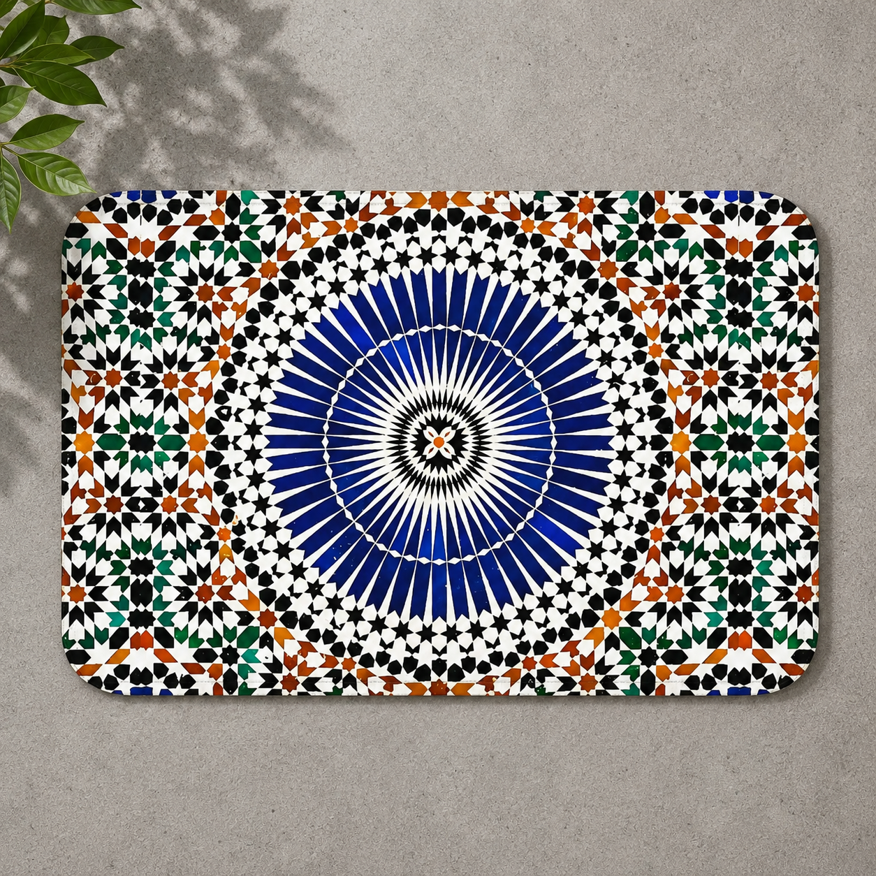 Rectangular Berber rug with intricate geometric blue, green, and orange mosaic pattern.