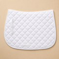 White quilted saddle pad with nylon straps, Tapis Kentucky style.