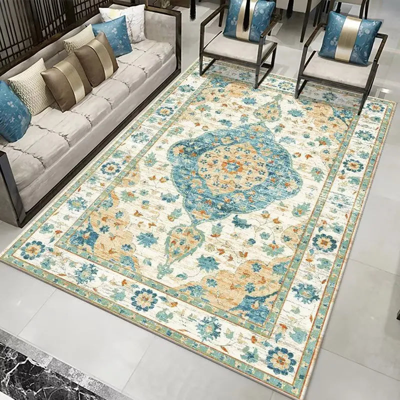 A vintage-style Persian rug with a central medallion in blue and orange hues, placed in a modern living room.