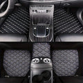Black diamond stitch car floor mats with white stitching, custom fit for luxury vehicle interior.