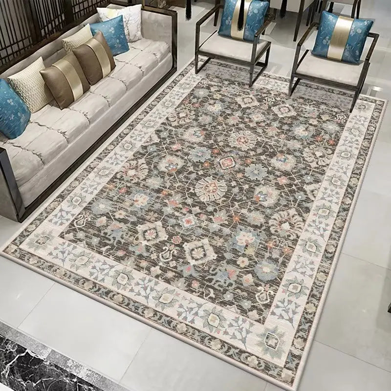 Persian-style area rug with intricate floral patterns in a living room setting.
