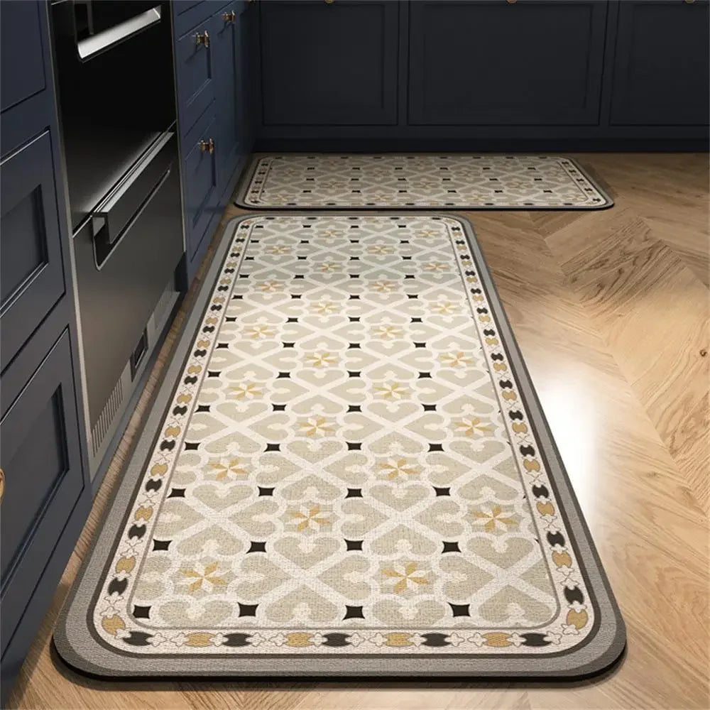 A long, rectangular kitchen mat with a vintage geometric pattern in beige, yellow, and gray.