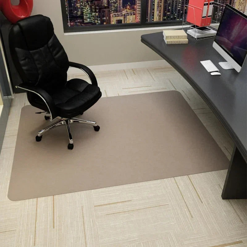 Beige rectangular office chair mat protecting light beige carpet from desk chair.