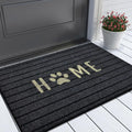 Black entryway doormat with "HOME" and paw print design.
