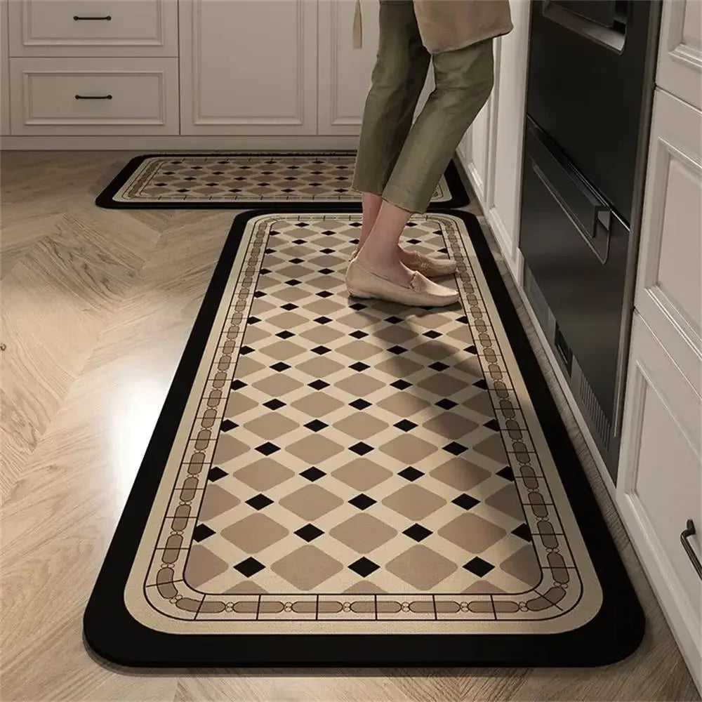 Tapis cuisine with a diamond pattern in beige and black, placed on a wooden floor in a kitchen.