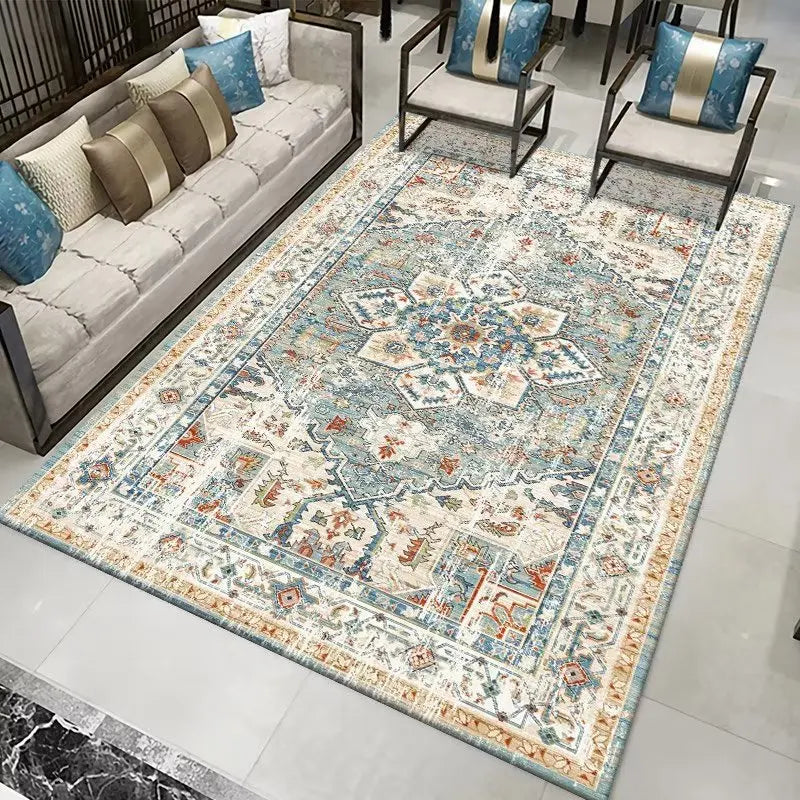 Persian-style area rug with intricate blue, cream, and orange floral and geometric patterns.