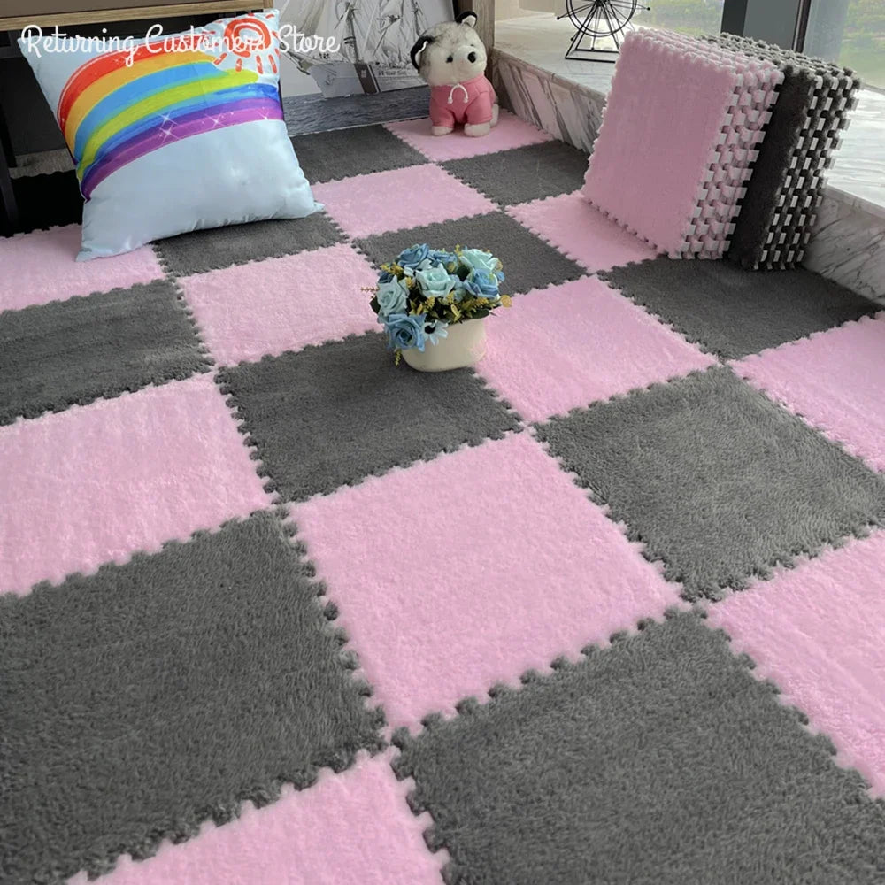 Soft pink and grey interlocking foam floor tiles arranged in a checkerboard pattern.
