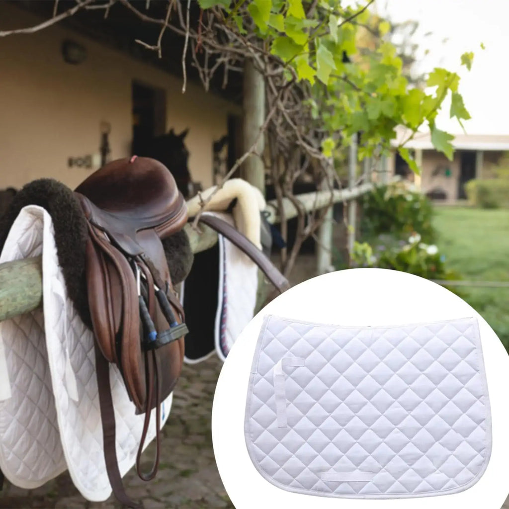 White quilted Kentucky saddle pad with diamond stitching, ready for use on a horse.
