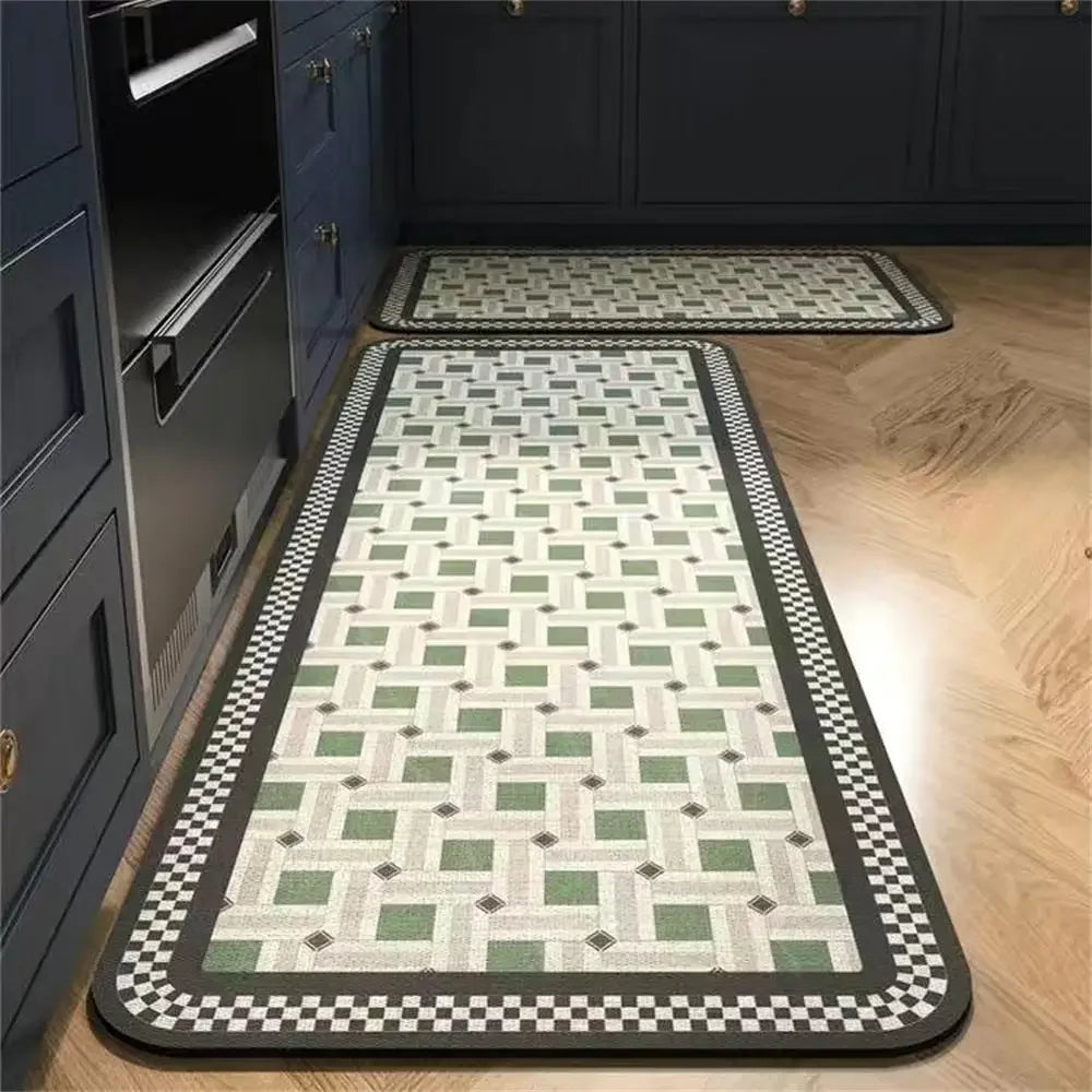 Kitchen runner rug with a geometric mosaic tile pattern in green and white, placed in a kitchen.