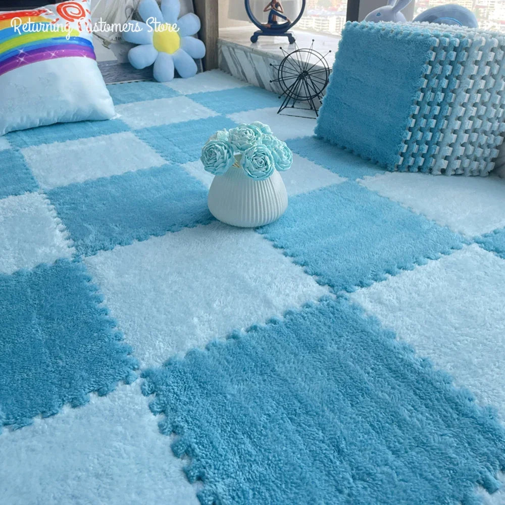 Soft blue and white interlocking puzzle floor mats with plush texture.