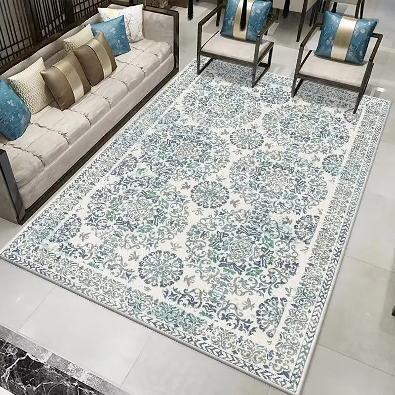 White and blue Persian style area rug with intricate floral and damask patterns.