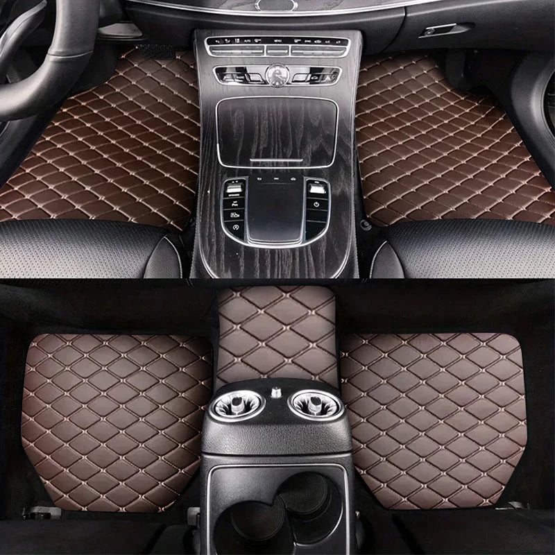 Brown diamond-stitched car floor mats covering the front and rear footwells of a luxury vehicle.