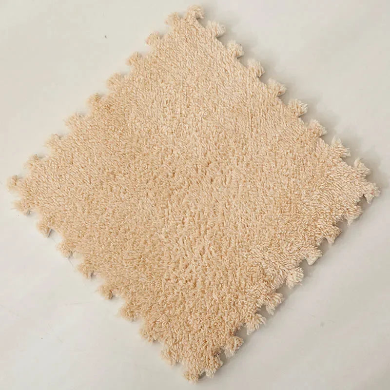Soft beige interlocking puzzle mat with a plush, textured surface.